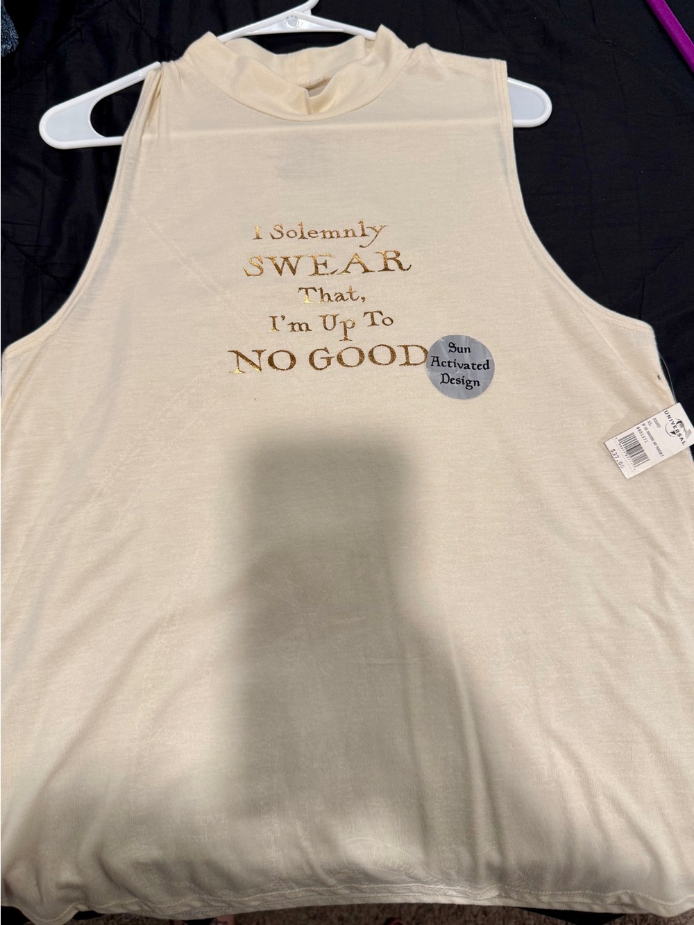 Warner Bros. Sleeveless Cream Graphic Tank with Gold Foil Text